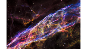 The Veil Nebula: A small section of the expanding remains of a massive star that exploded about 8,000 years ago.